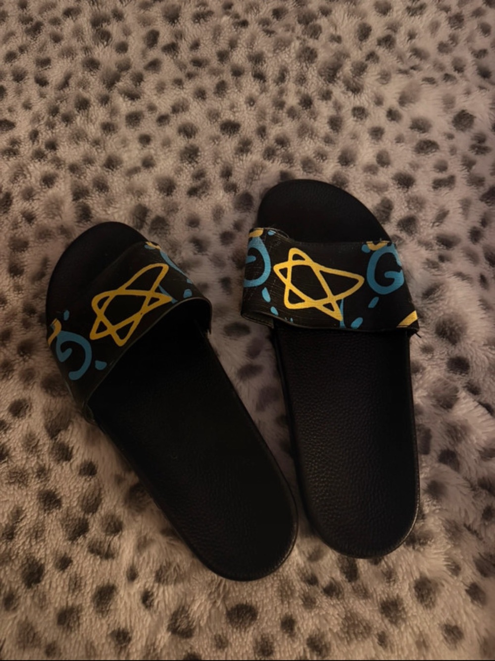 Gucci Black Slides with Yellow and Blue Graphic Strap